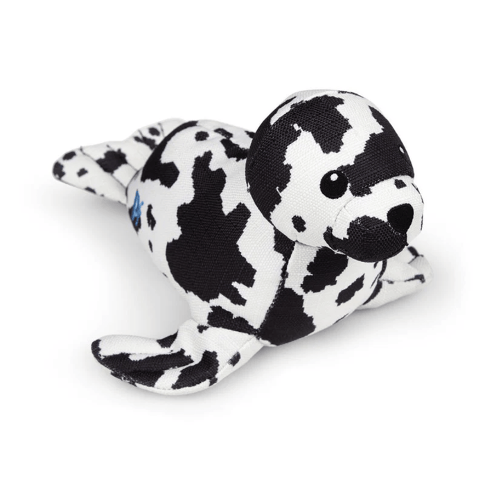 Black and white seal plush dog toy on a white back ground.