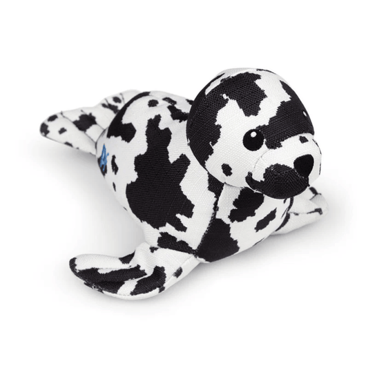Black and white seal plush dog toy on a white back ground.