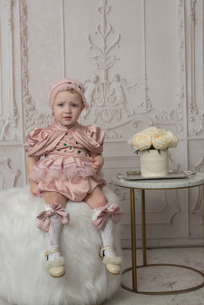 Pink ballerina hair sash showing pleated fabric, lace trim, and ribbon ties