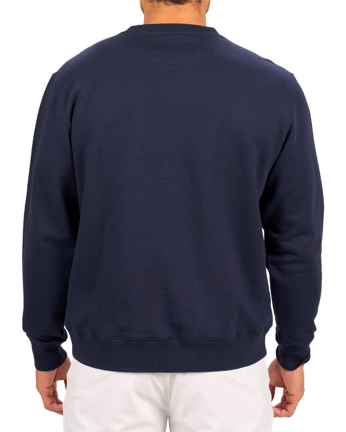 man wearing an navy colored sweater from Black Clover with a 3d text BLCK CLVR on the chest