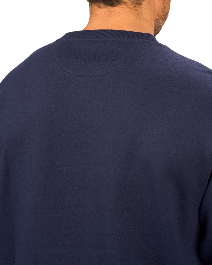 man wearing an navy colored sweater from Black Clover with a 3d text BLCK CLVR on the chest