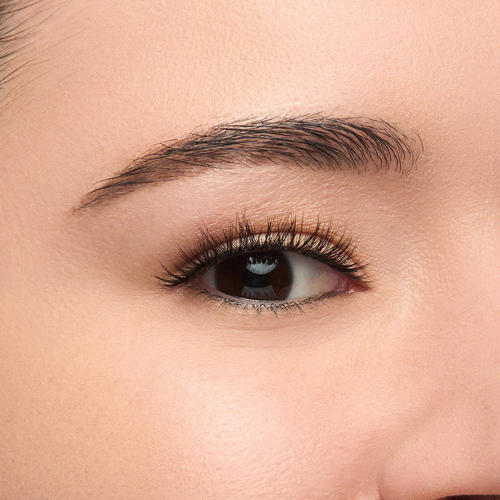 Sadie Mini a mini round lash with short length and medium volume shown on an eye.