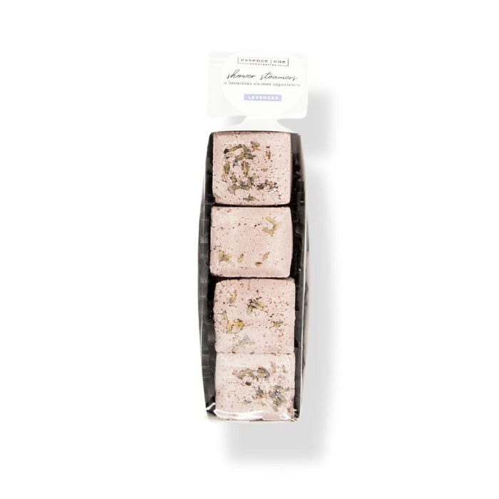 Four square pink Shower Steamer | Essence One pieces with dried herbs on top, neatly arranged in clear packaging for an uplifting spa-like wellness experience.
