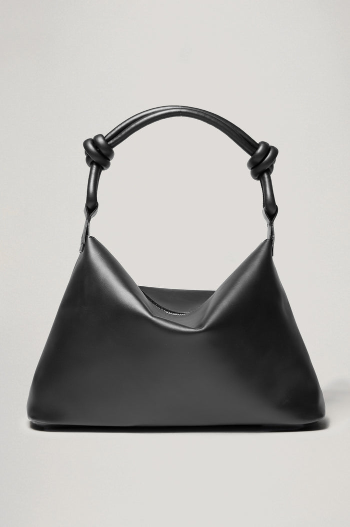 Siena Slouchy Hobo Bag in Italian Leather With Knotted Top Strap, Zipper Closure With Fringe Tassel And Interior Snap Button Slip Pocket in Black Colorway - Front View Featured