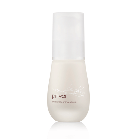 Bottle of Skin Brightening Serum | Privai with minimalist design, featuring soft white packaging and subtle floral graphics, ideal for skincare routines.