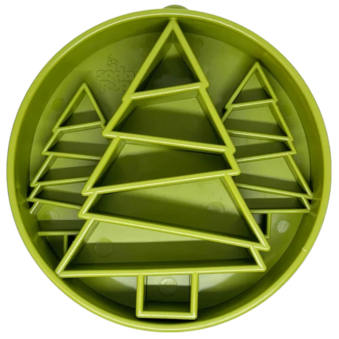 Green plastic shape sorter toy with geometric shapes on a white background