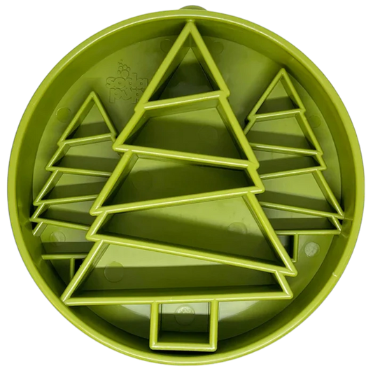 Green plastic shape sorter toy with geometric shapes on a white background