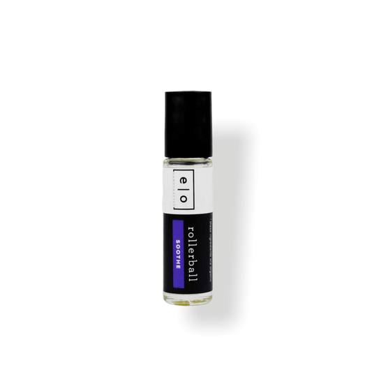Soothe Rollerball - Abdominal Support | Essence One in a clear glass bottle with black cap, designed for wellness and body care support with a rollerball applicator.