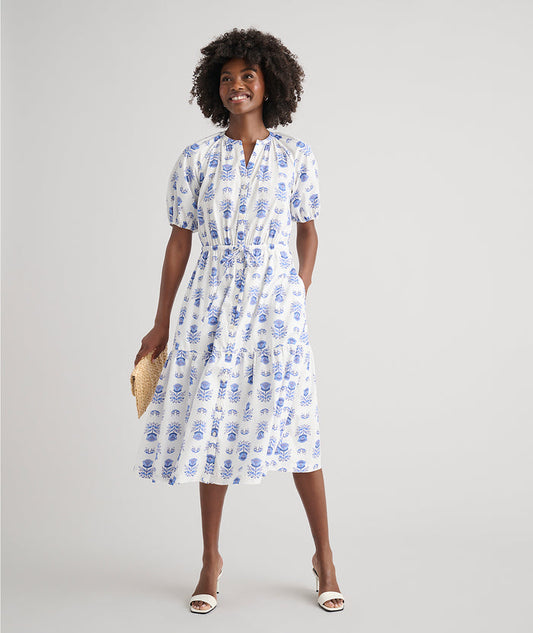 Model is wearing UNTUCKit Brigitte dress in floral white print.