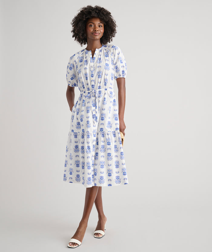 Model is wearing UNTUCKit Brigitte dress in floral white print.