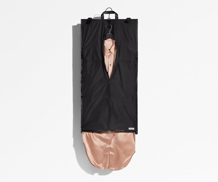 Carry-On sized Centerfold Garment Sleeve packed with a dress