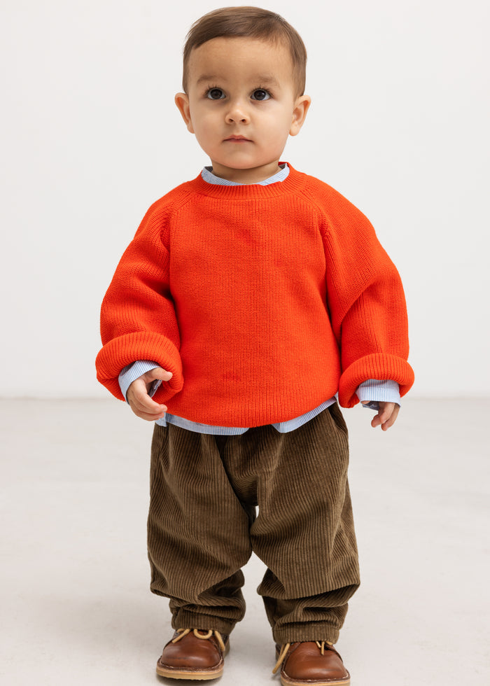 Torin B orange shirt in orange with ribbed cuffs and round neckline