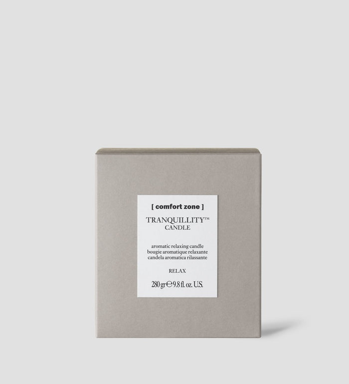 Box packaging of the Tranquillity Candle | [ comfort zone ], an aromatic relaxing candle designed for wellness and relaxation.
