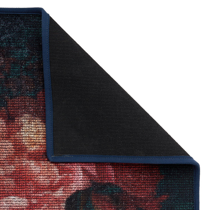 Twilight Garden Eco-Washable Rug made from 100% recycled materials, featuring an oversized bloom pattern against a black background.