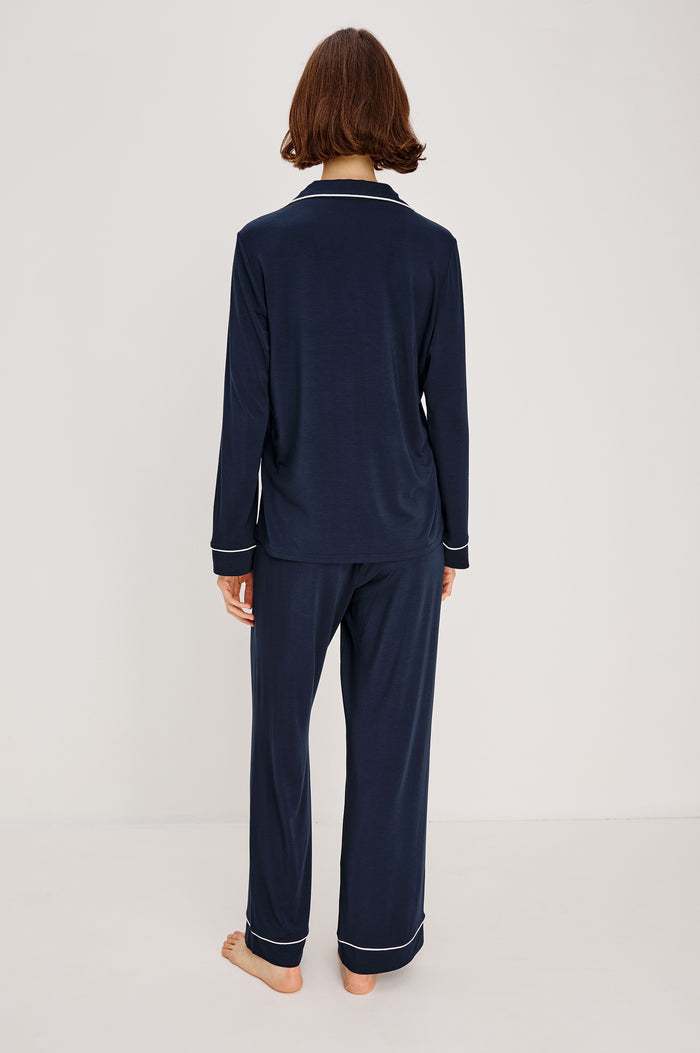 Varra Pajama Set in Jersey With Contrast Piping Button-Up Shirt With Notched Collar and Long Sleeves and Matching High-Waisted Pants With Adjustable Waist Drawstring Ties in Loose Fit in Navy Colorway - Lower Body Front Close Up View Featured on Model