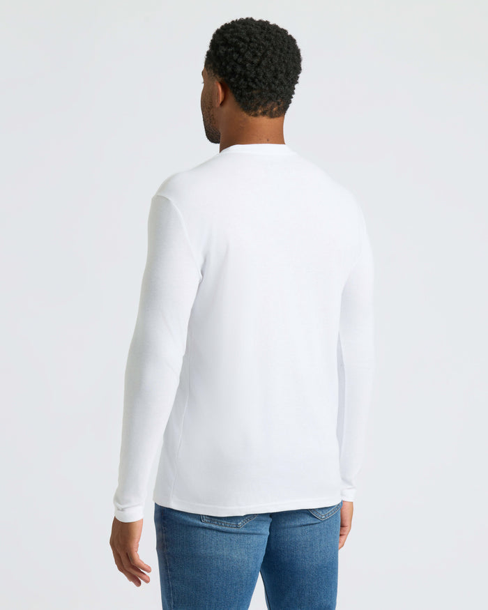 Man in Core Long Sleeve Crew Neck T-Shirt, back view.