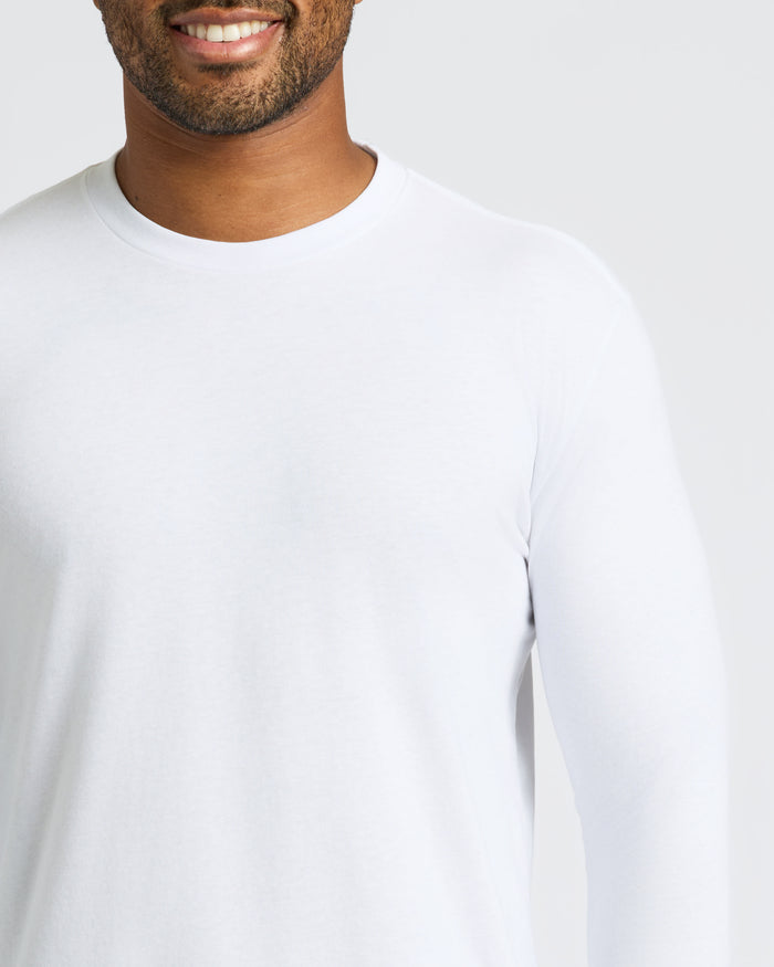 Man wearing a Core Long Sleeve Crew Neck T-Shirt.
