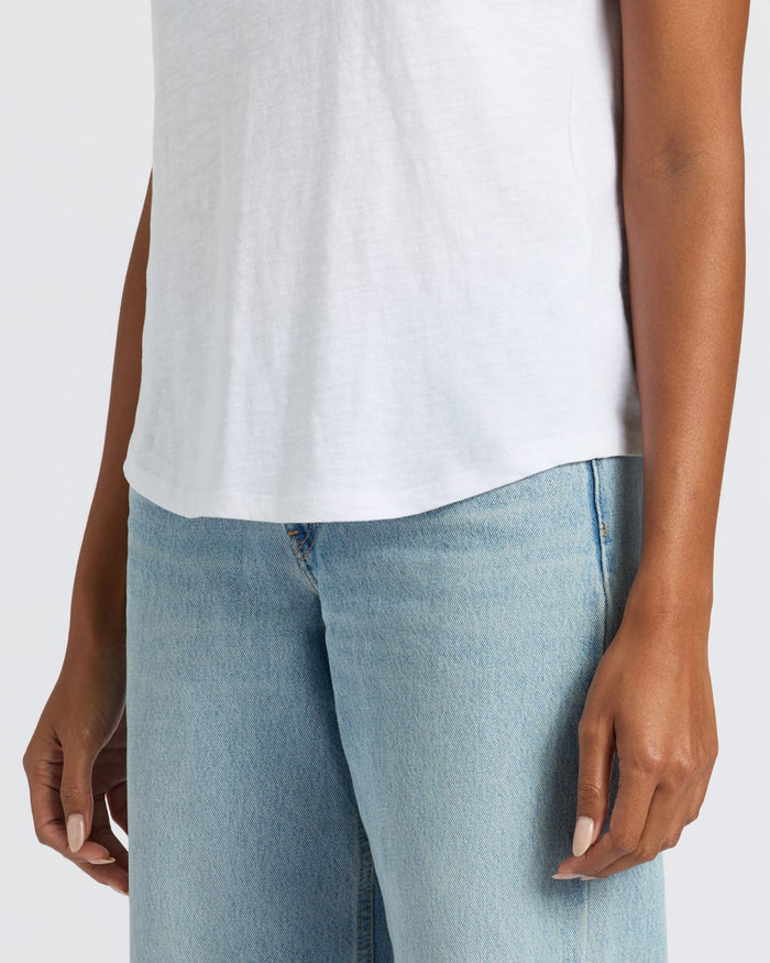 Womens White Slub Scoop Neck Tee 4-Pack worn with light-wash jeans.